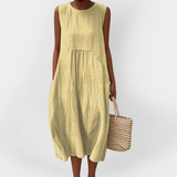 Abito elegante in cotone senza maniche con tasche