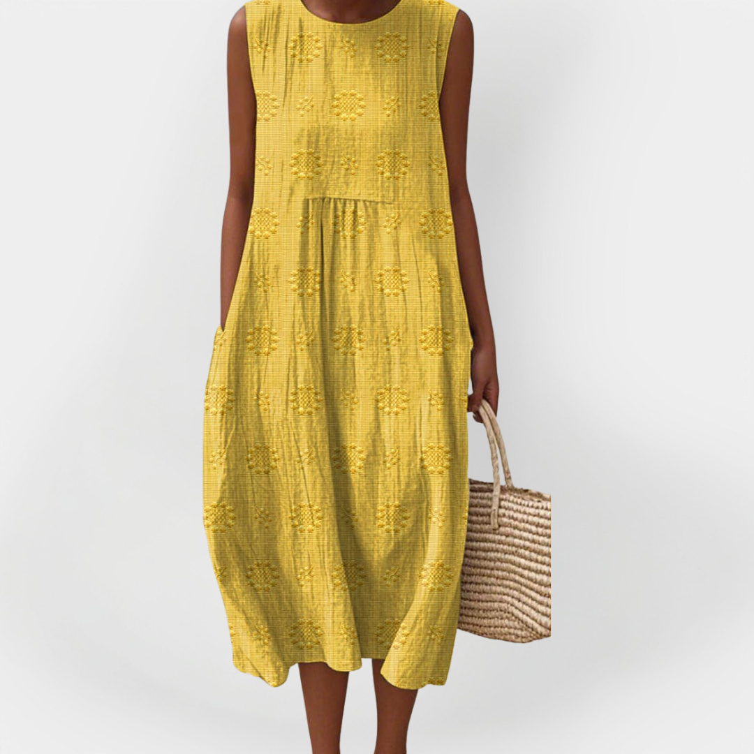 Abito elegante in cotone senza maniche con tasche