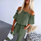 Nicoletta - Tuta elegante con spalle scoperte e laccio in vita