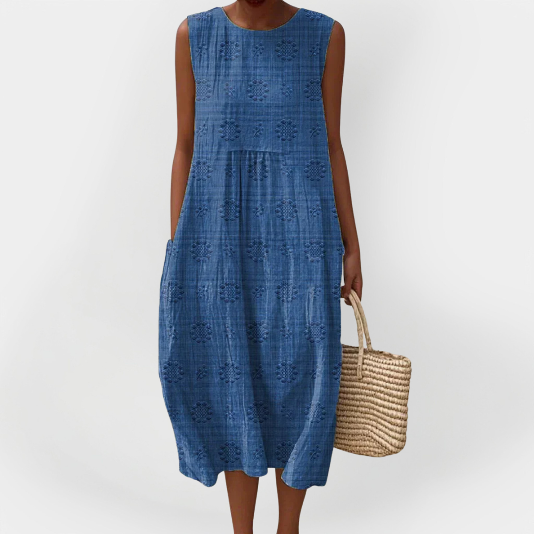 Abito elegante in cotone senza maniche con tasche