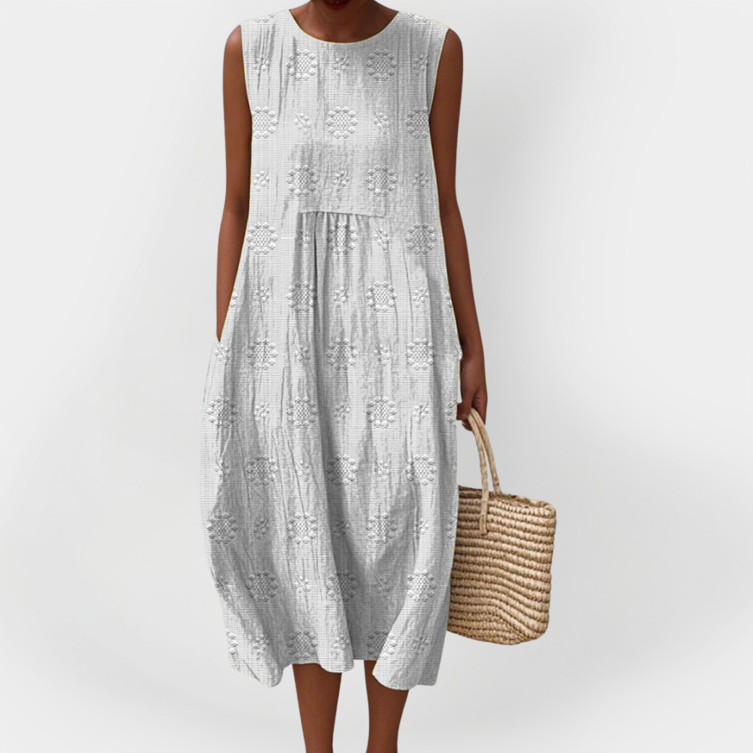 Abito elegante in cotone senza maniche con tasche