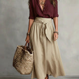 RIVER | Set di Due Pezzi: Top Nero e Gonna Midi Verde Oliva