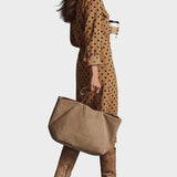 Abito midi in ecopelle a pois
