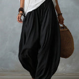 Set Top Bianco Off-Shoulder e Pantaloni Larghi