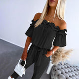 Nicoletta - Tuta elegante con spalle scoperte e laccio in vita