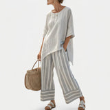 Clarissa - Completo con blusa asimmetrica